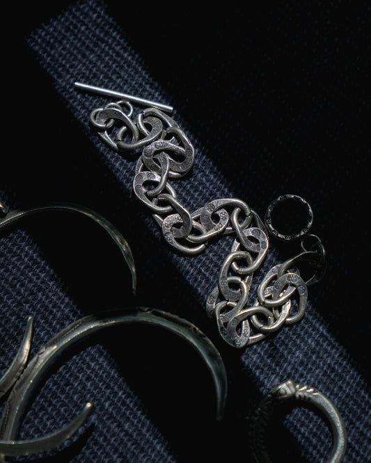 Karen Hill Tribe Silver Work , Bracelet handcrafted in Thailand by Taki . Hammered PHOD DUANG pattern. Sold in Hong Kong by certified.fingers.