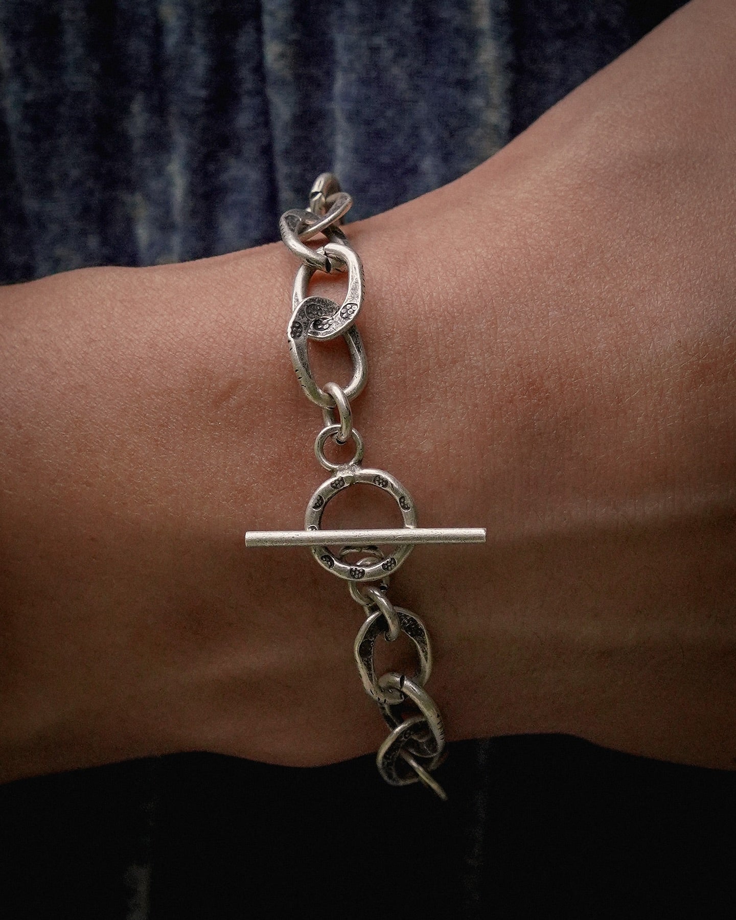 Karen Hill Tribe Silver Work , Bracelet handcrafted in Thailand by Taki . Hammered PHOD DUANG pattern. Sold in Hong Kong by certified.fingers.