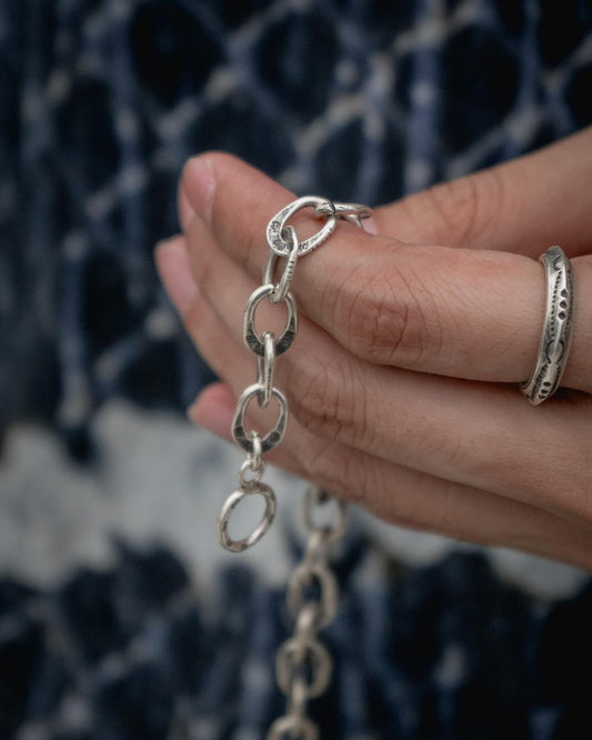 Karen Hill Tribe Silver Work , Bracelet handcrafted in Thailand by Taki . Hammered PHOD DUANG pattern. Sold in Hong Kong by certified.fingers.